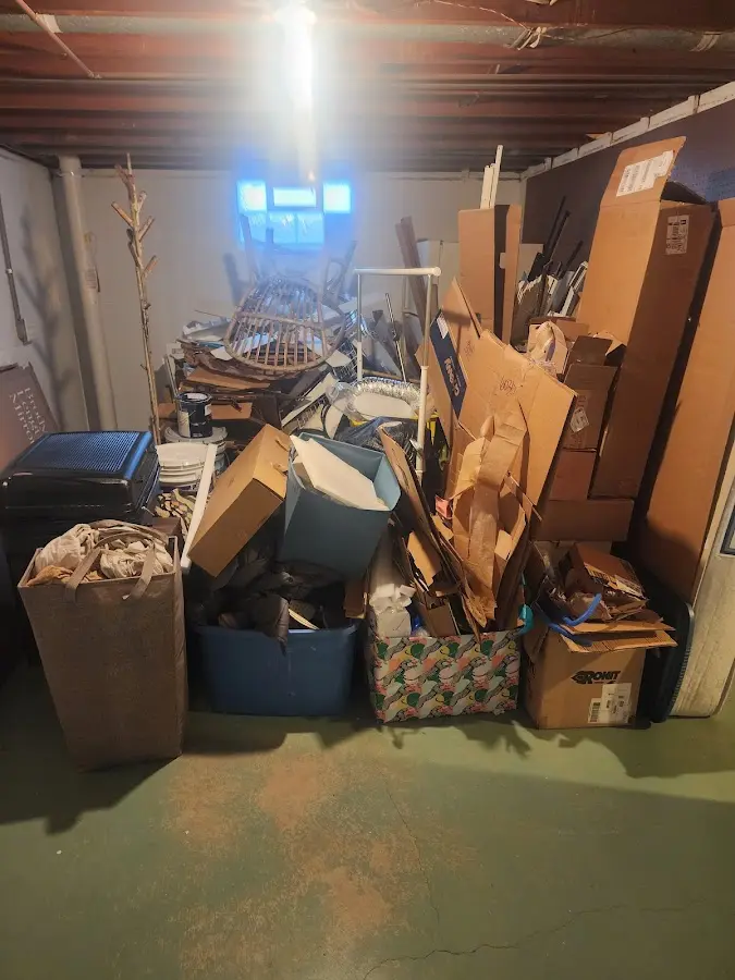 Roll-off dumpster container at job site for Roll Off Dumpster Rental in Laureles